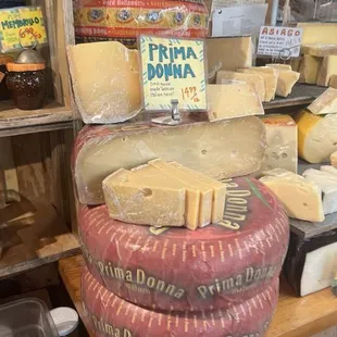 Time to get cheesy . Wheels of cheese.