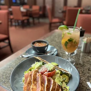 a plate of food and a drink