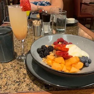 Granola with a side of peach mimosas
