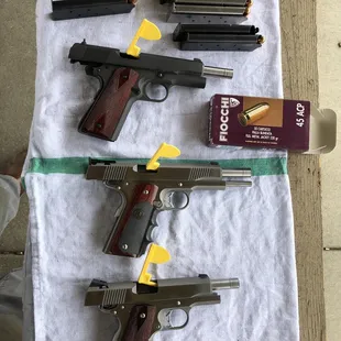 Springfield - Mil. Spec. 1911 A-1 in 45acp  Dan Wesson - Point man 7  in 45acp Dan Wesson - combat commander in 45acp