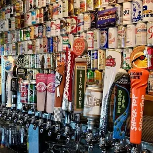 a wall full of beer taps