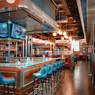 The dining room is warm and comfortable, with an upscale, vintage inspired atmosphere.