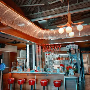 The dining room is warm and comfortable, with an upscale, vintage inspired atmosphere.