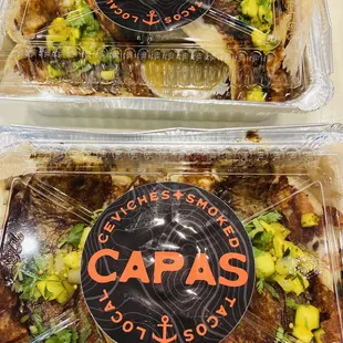 Nicely packaged to go tacos