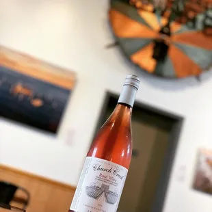 a bottle of wine on a table