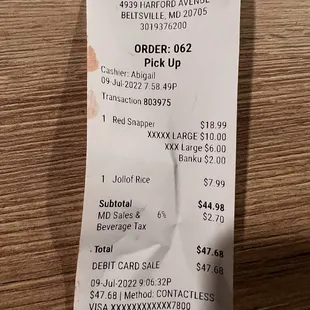 Red snapper, banku and jollof rice. Very expensive.