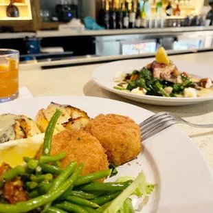 Crab stuffed figure 8 flounder with risotto cake