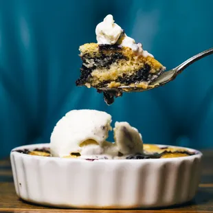 a piece of cake being lifted by a fork