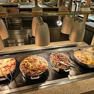 a buffet with a variety of food items