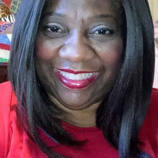 Tara E.