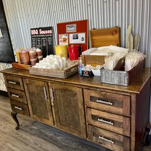 BBQ sauce/condiments/utensils area