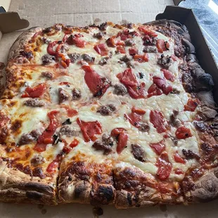 Sausage and red roasted pepper Sicilian pizza