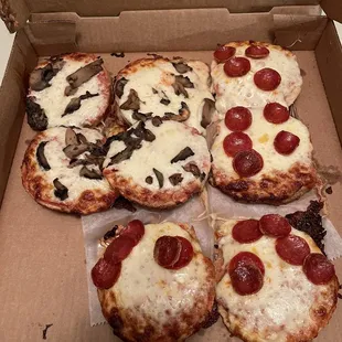 Four pizza bagels, two mushroom, two pepperoni. (When ordering keep in mind each Bagel is a whole bagel, my order of four was eight pieces)