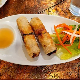 Imperial Rolls with dipping sauce.