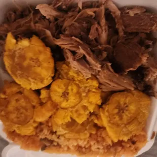 Pernil combo plantains arroz con gandules./ rice with pigeon peas