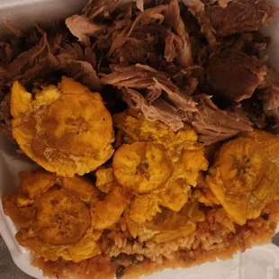 Pernil plantains arroz con gandules.