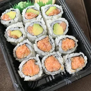 Alaska Roll (w/o cucumber), and a Spicy Tuna Roll