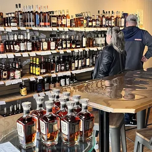 a man and a woman at a bar