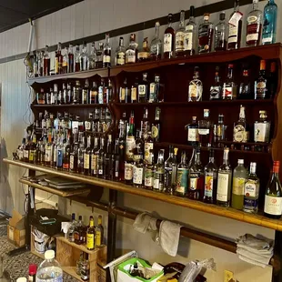 shelves of liquor and liquor bottles