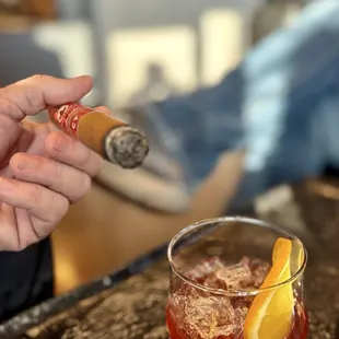 Old fashioned and a CT cigar.