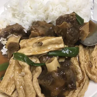 18. Ox Tail with Dried Bean Curd over Rice