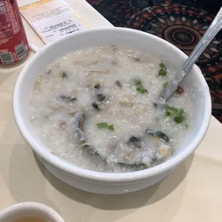 144. Congee with Preserved Egg and Shredded Pork