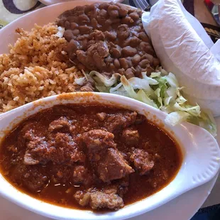 Rojo pork with rice, beans and corn tortillas