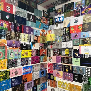 a wall full of beer boxes