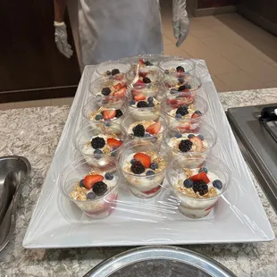 a tray of desserts on a counter