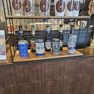 a bar with a variety of drinks