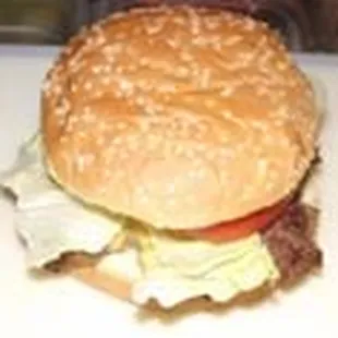 a hamburger with lettuce and tomato