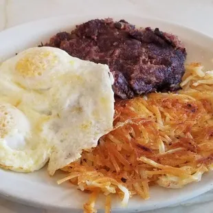 Corn beef hash, eggs, hash browns + comes with 2 pancakes