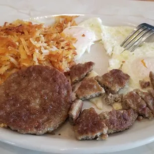Basic 2 eggs, hash browns, plus sausage patty breakfast....comes w/ 2 pancakes
