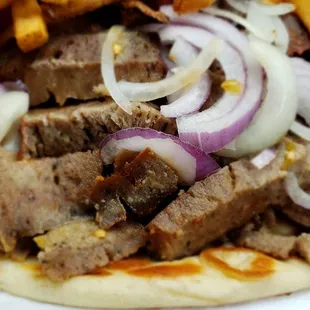 The gyro sandwich before I ate half the meat and frys which still left me with a gyro sandwich.