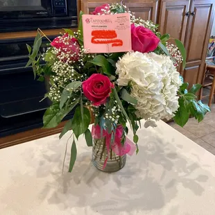 On receipt: pink roses, eucalyptus, white hydrangeas. 1 out of 3 isn&apos;t good.