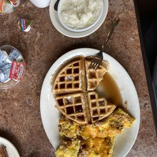 Meat Lovers omelette with cheese and country grits comes with waffle or panny cake. Whew!!!!!