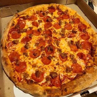 Pizza with pepperoni and sausage