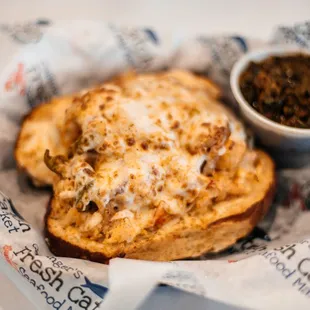 a piece of bread with cheese on it