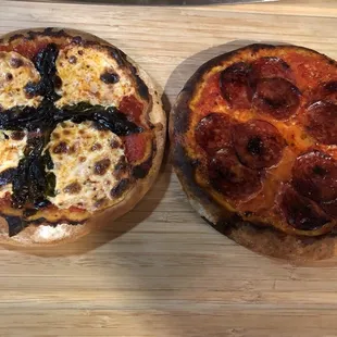Amazing handmade crispy pizzas.  Left-Margherita pizza Right-upscale pepperoni