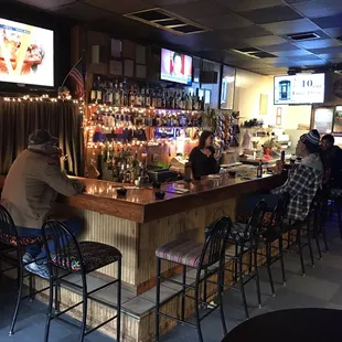 people sitting at the bar