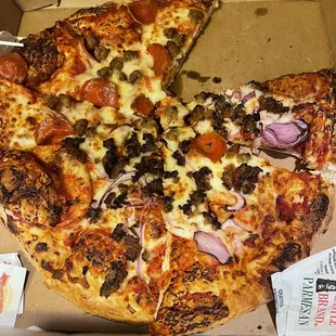 a whole pizza in a box