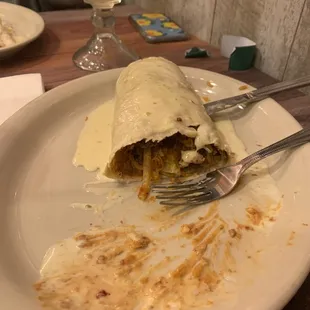 Special burrito with chicken and steak.