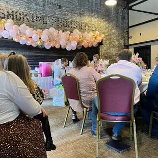 a group of people sitting at tables