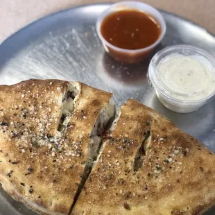 Pepperoni and mushroom calzone