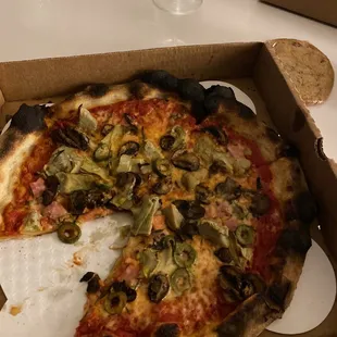 This is the replacement for a pizza they threw away because it had a hole in it.