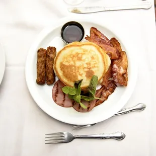 a pancake with bacon and vegetables