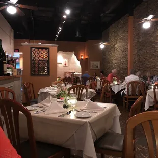 a restaurant with tables and chairs