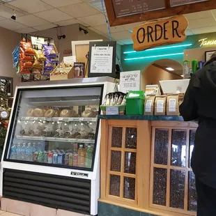 a woman standing at a counter