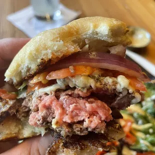 Raw hamburger meat! The way the staff handled my complaint was unsatisfactory, too. I&apos;ll definitely be posting a followup review.