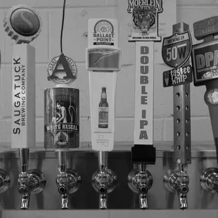 a row of beer taps